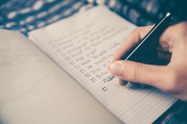 close up of a notebook with a to-do list on it